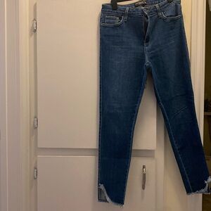 Jeans skinny with cropped flare with fringe